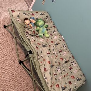 Farm Print Green Pack And Play.  Rolls Up For Storage And When Not In Use.
